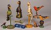 Seven Johnathan Bastian carved and painted birds