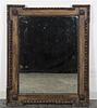 * A Continental Carved Walnut Mirror Height 49 x width 39 3/4 inches.