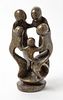 * A Carved Stone Figural Group Height 10 inches.