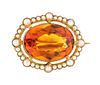 * A Victorian 15 Karat Yellow Gold, Citrine and Seed Pearl Brooch, 2.80 dwts.