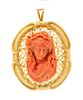 * An 18 Karat Yellow Gold and Coral Cameo Pendant/Brooch, 26.10 dwts.