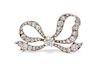 An Edwardian Platinum Topped Gold and Diamond Bow Brooch, Tiffany & Co., 5.70 dwts.