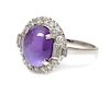 A Platinum, Purple Star Sapphire and Diamond Ring, Circa 1950, 5.00 dwts.