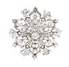 * A Platinum and Diamond Snowflake Brooch, 16.10 dwts.