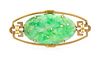 * A Yellow Gold and Jadeite Jade Brooch, 4.30 dwts.