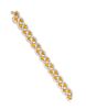 * A Yellow Gold, Yellow Sapphire and Diamond Bracelet, 24.50 dwts.