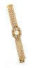 * A 14 Karat Yellow Gold, Cultured Pearl, and Sapphire Wristwatch, Perle, 32.40 dwts.