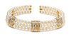 An 18 Karat Yellow Gold, Cultured Pearl and Diamond Collar Necklace, 60.10 dwts.