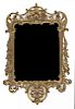A Louis XV Style Carved Giltwood Wall Mirror Height 56 1/2 x width 27 1/2 inches.