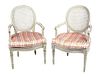 A Pair of Louis XVI Style Painted Fauteuils Height 34 12 inches.