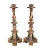 A Pair of Italian Carved and Painted Gilt Candlesticks Height 14 1/2 inches.