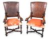 A Pair of Renaissance Revival Style Mahogany Open Armchairs Height 50 x width 25 x depth 24 inches.