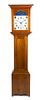 An American Tall Cherry Case Clock Height 76 1/2 x width 19 3/4 x depth 11 1/2 inches.