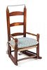 An American Ladder Back Child's Rocking Chair Height 25 1/2 inches.