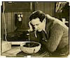 Houdini, Harry. Movie Still of Houdini in Terror Island. Los Angeles, [1920]. Sepia tone proof photo