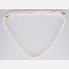 An 18kt. Yellow Gold, Diamond and Pearl Necklace,