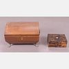 An English Mahogany Fitted Sewing Box raised on Brass Paw Feet, 19th Century,