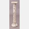 A Carved Alabaster Column Form Pedestal, 20th Century.
