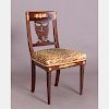 A French Empire Mahogany Side Chair with Ormolu Mounts, 19th Century.