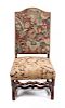 * A French Provincial Tapestry Upholstered Walnut Fauteuil Height 42 1/2 inches.