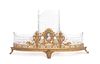 * A Continental Gilt Bronze and Cut Glass Centerpiece Length 18 inches.