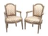 * A Pair of Louis XVI Style Cream Painted Fauteuil Height 24 inches.