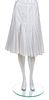 * A Dolce & Gabbana White Eyelet Pleated Skirt, Size 44.