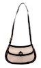 An Hermes Toile and Dark Brown Leather Handbag, 11.5" x 7.5" x 2.5".