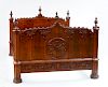 GOTHIC CARVED MAHOGANY BEDSTEAD, POSSIBLY NEW YORK, C. 1850