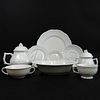 A sixty-three (63) piece set of CERALENE dinnerware by Limoges.