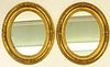 Pair of Gilt Carved Oval Mirrors.