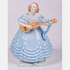 A Large Herend Porcelain Figure, Woman In Blue Dress with Guitar