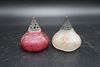 Two Mt. Washington Glass Salt Shakers, one clear, one red bark, height 2 1/2 inches.