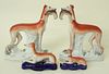 Pair of Staffordshire Pottery Greyhounds with Rabbits, mid 19th Century