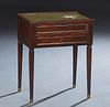 Diminutive French Louis XVI Style Carved Mahogany Lamp Table, early 20th c, the 3/4 galleried inset green leather top over a bank of two drawers, on t