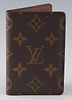 Louis Vuitton Organizer de Poche Wallet, in brown monogram coated canvas, opening to a tonal lined interior with four open pockets and two card slots,