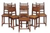 Set of Six French Henri II Style Oak Dining Chairs, c. 1880, with a lion carved spindled crest rail over a reeded horizontal splat, above a trapezoida