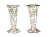 Pair of English Sterling Art Nouveau Candlesticks, 1903, London, by the Goldsmith and Silversmith Co., the pierced trumpet vases with green glass inse