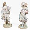 Pair of Continental Polychromed Porcelain Figures, late 19th c., of a man and woman in 19th c., costume, the underside with a blue anchor mark, He- H.