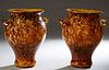 Unusual Large Pair of Blown Glass Baluster Footed Urns, 20th c., with applied handles, probably Murano glass, H.- 14 in., W.- 12 in., D.- 10 in. Prove