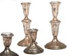 American 20th century sterling candlesticks American 20th century sterling candlesticks weighted.
1st pair approx: 7" h
2nd pair: 3 1/2" h 
