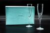Pair of Tiffany & Co champagne flutes Pair Tiffany & Co champagne 6 oz flutes, appear to be new and unused in original boxApprox 9-1/2" h  each