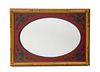 Victorian style Mirror Victorian style mirror with oval mirror plate now framed in a red lacquer surround with a carved and gilt wood frame 
Approx o