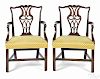 Pair of George III mahogany armchairs, ca. 1770, each with an elaborately carved and pierced splat