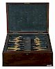 Set of stag handled utensils, 19th c., in a fitted mahogany case with a plaque