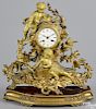 French gilt bronze figural mantel clock, late 19th c., the dial signed Hry Marc Paris