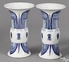 Pair of Chinese blue and white porcelain gu-form vases, having lappet decoration, 11'' h.