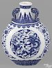 Chinese blue and white export porcelain moon flask decorated with dragon medallions