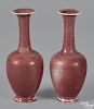 Pair of Chinese peach bloom vases, Kangxi mark and of the period, 6 3/4'' h.