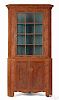 Pennsylvania painted poplar two-part corner cupboard, early 19th c.